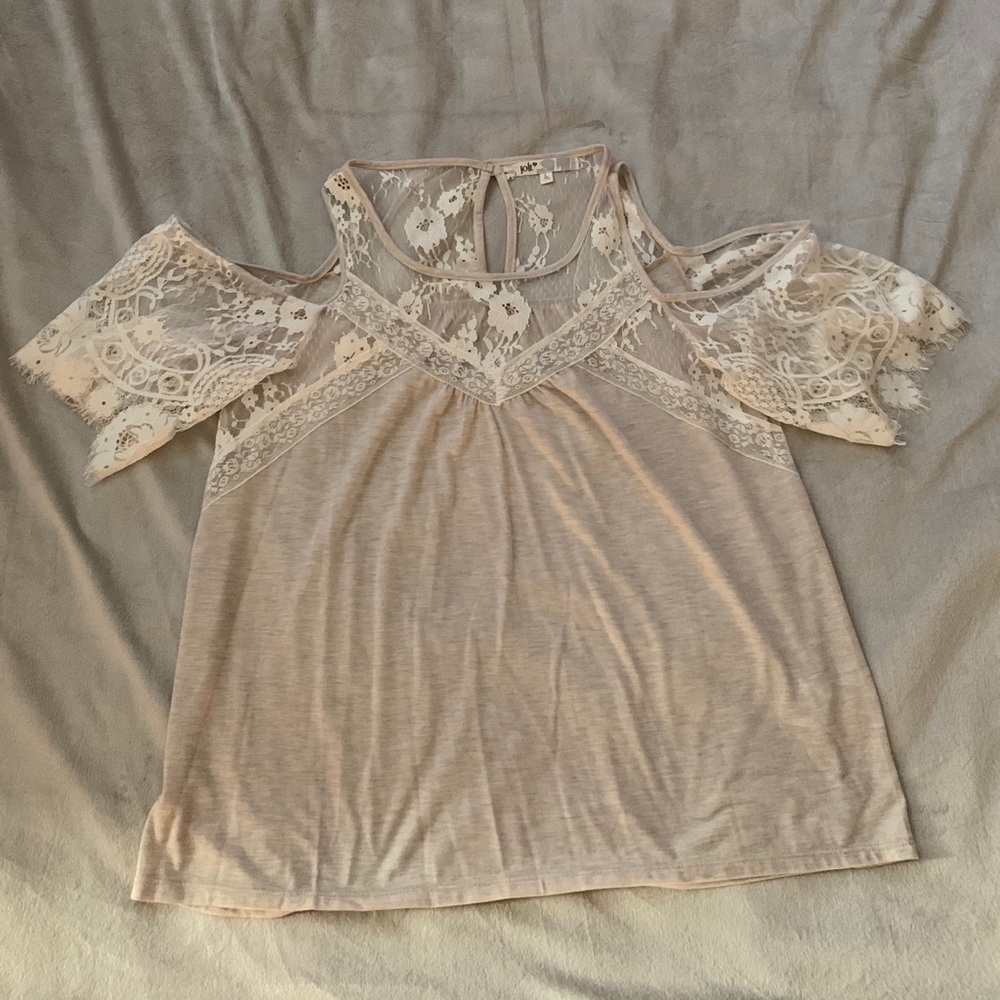 Cream blouse with the lace cut out sleeves